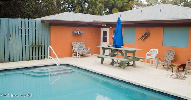 rear view of house featuring a patio