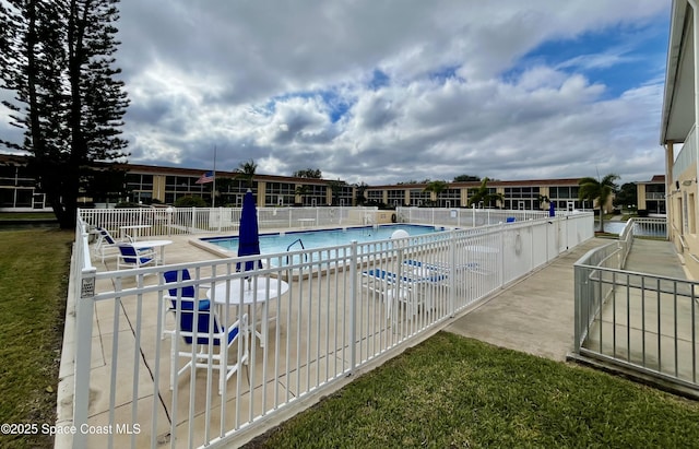 view of pool with a patio area