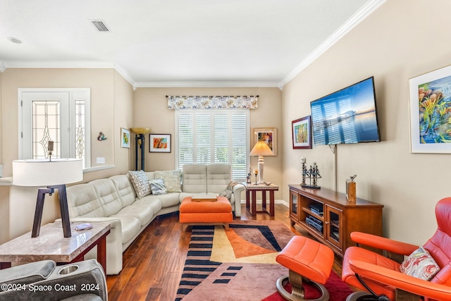 living room with dark hardwood / wood-style floors and ornamental molding