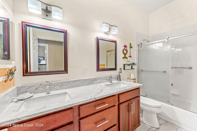 full bathroom featuring tile patterned flooring, vanity, toilet, and enclosed tub / shower combo