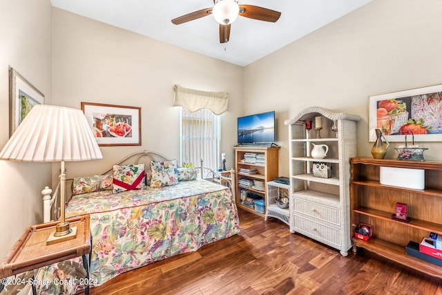 bedroom featuring ceiling fan and dark hardwood / wood-style flooring