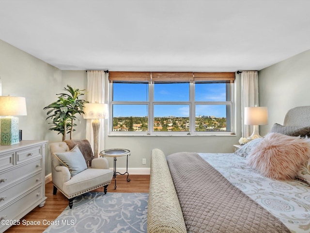 bedroom featuring hardwood / wood-style flooring