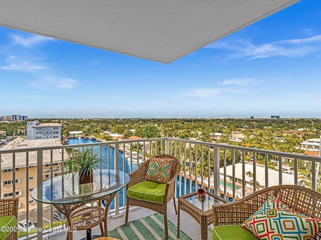 balcony featuring a water view