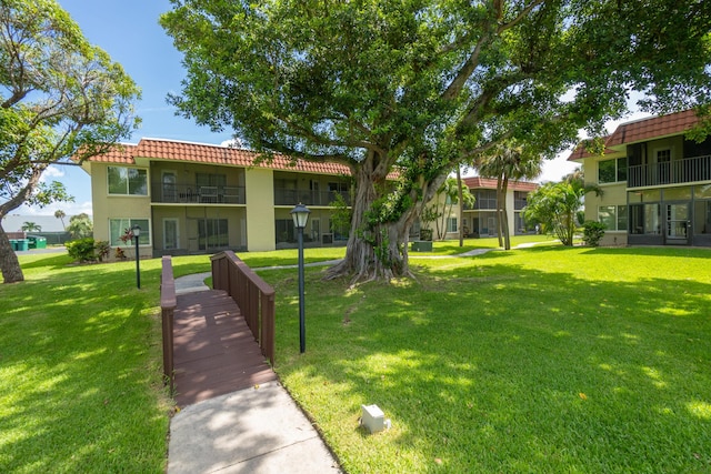 view of community featuring a yard