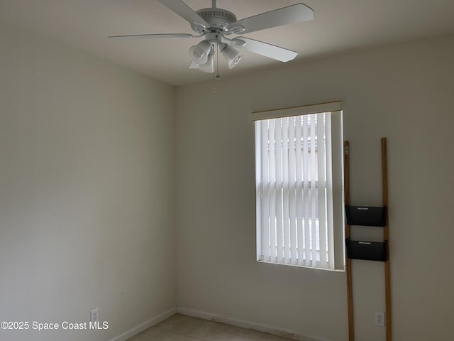 unfurnished room featuring ceiling fan