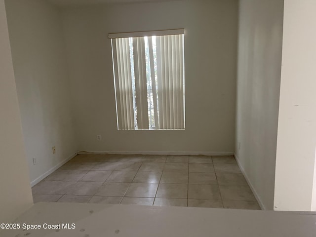 view of tiled spare room