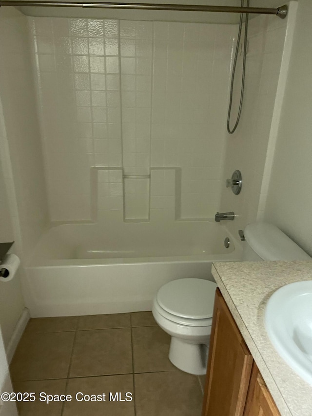 full bathroom with vanity, toilet, tile patterned floors, and bathtub / shower combination