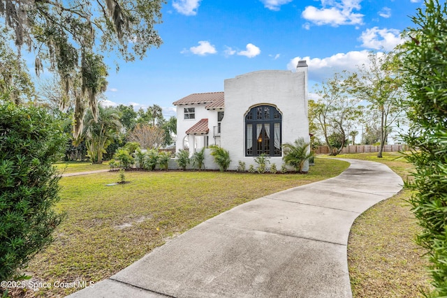 view of front of house with a front lawn