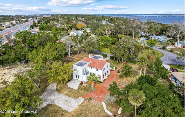 drone / aerial view featuring a water view