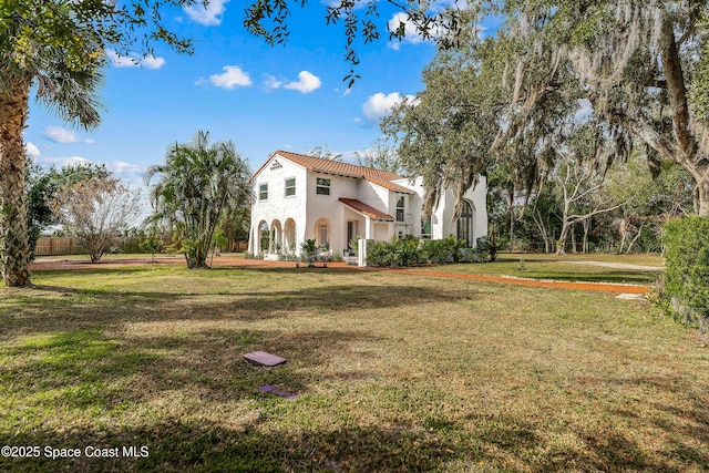 exterior space with a front yard