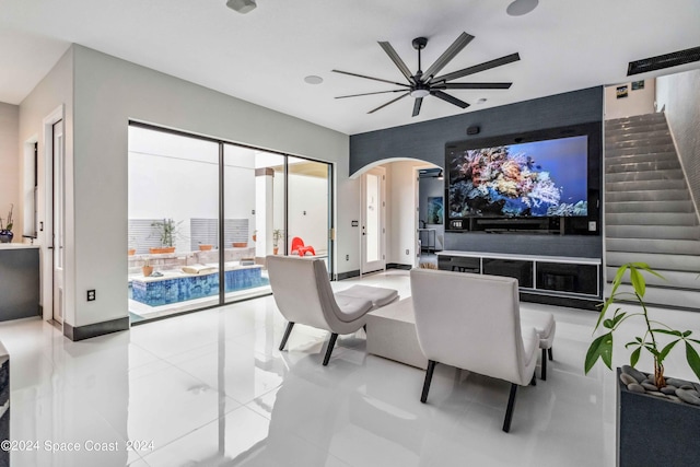 interior space featuring ceiling fan