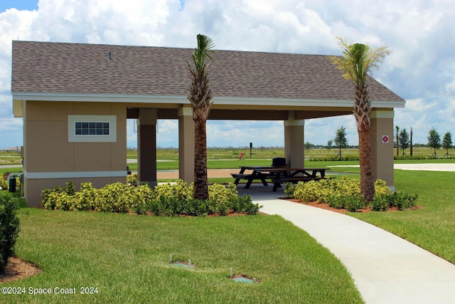 view of community featuring a gazebo and a yard