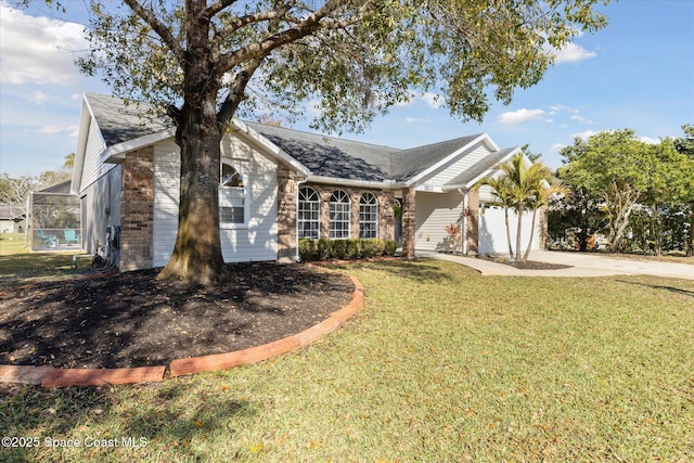 ranch-style home featuring a garage, a lanai, and a front yard