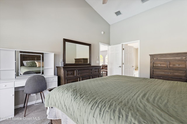 bedroom featuring ceiling fan, light carpet, and high vaulted ceiling