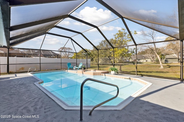 view of pool with a lanai, a patio, and a jacuzzi