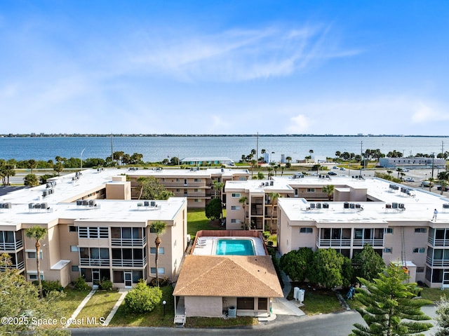 bird's eye view with a water view