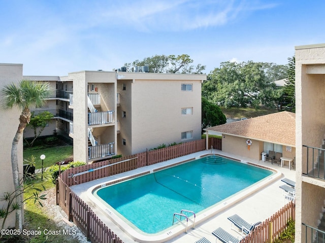 view of pool featuring a patio area