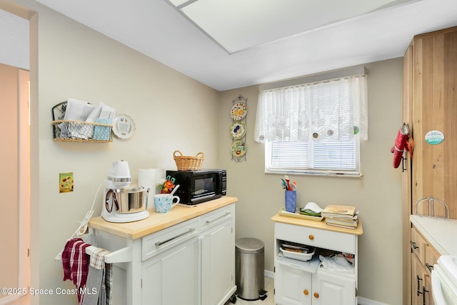 interior space with white cabinets