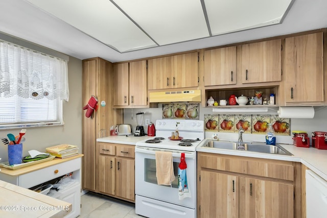 kitchen featuring sink and white appliances