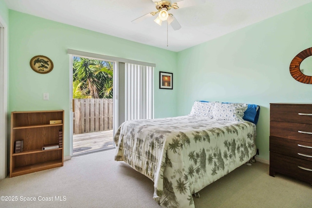 bedroom with ceiling fan, light colored carpet, and access to outside