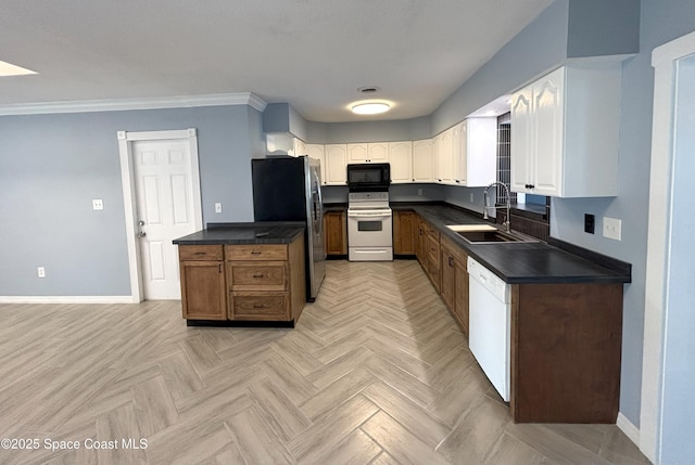 kitchen featuring white cabinetry, sink, light parquet floors, ornamental molding, and white appliances