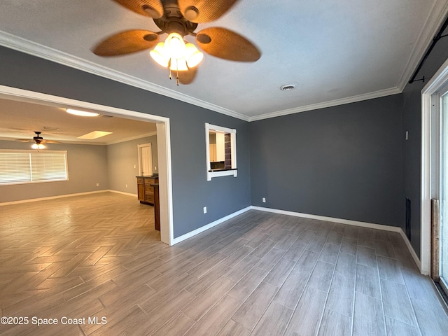 empty room with hardwood / wood-style flooring, ceiling fan, and ornamental molding