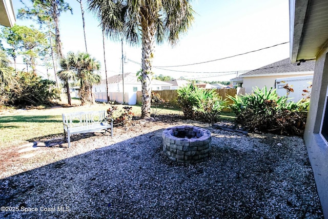 view of yard featuring a fire pit