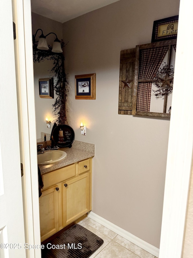 bathroom with vanity and tile patterned flooring