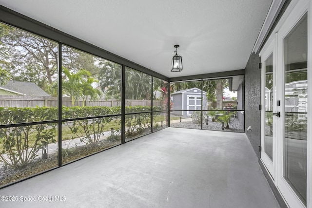 unfurnished sunroom with a healthy amount of sunlight