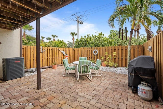 view of patio / terrace featuring central AC unit and area for grilling