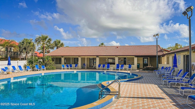 view of swimming pool featuring a patio