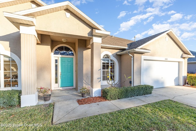 property entrance with a garage