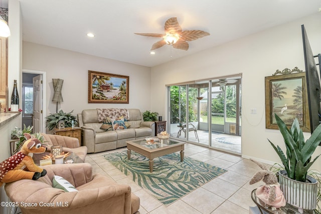 tiled living room featuring ceiling fan