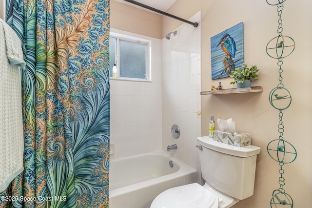 bathroom with shower / bath combo with shower curtain and toilet