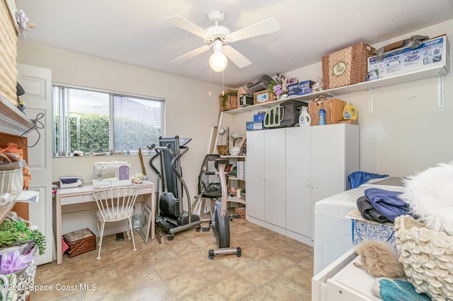 office space featuring ceiling fan, washer / clothes dryer, and a textured ceiling