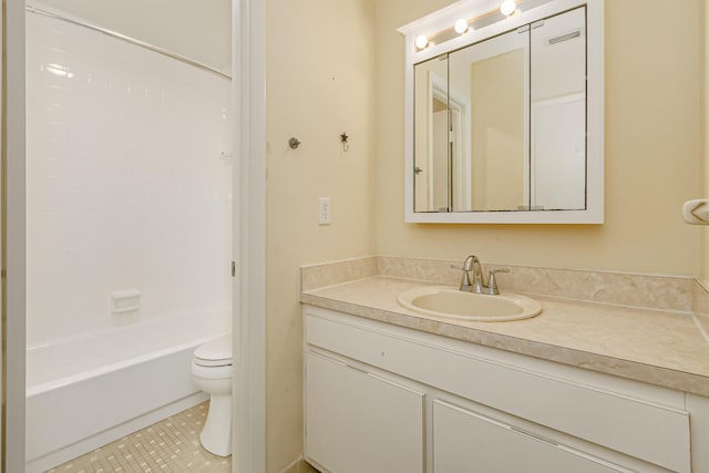 full bathroom featuring toilet, tile patterned flooring, shower / washtub combination, and vanity