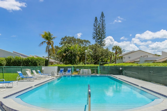 view of swimming pool featuring a patio