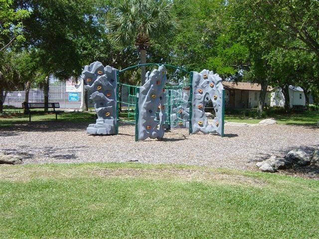 view of playground featuring a yard