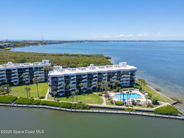 birds eye view of property featuring a water view