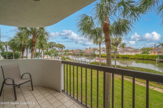 balcony featuring a water view