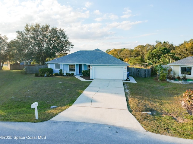 ranch-style house with a front yard and a garage