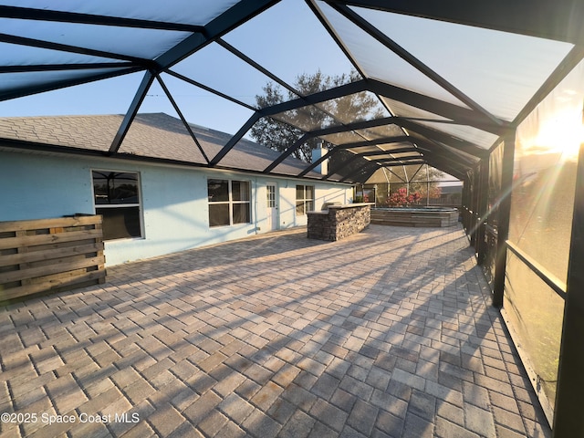 view of patio / terrace with glass enclosure