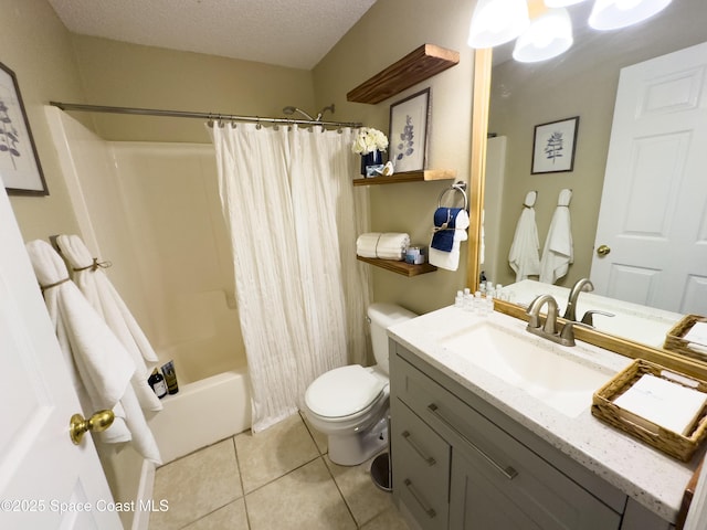 full bathroom with vanity, a textured ceiling, tile patterned floors, toilet, and shower / bath combo with shower curtain