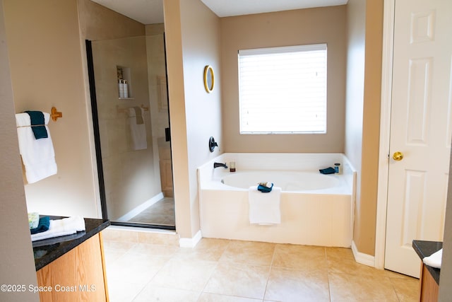 bathroom featuring independent shower and bath and tile patterned floors