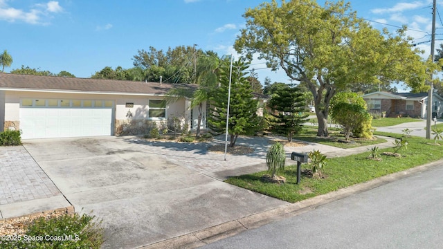 single story home with a garage