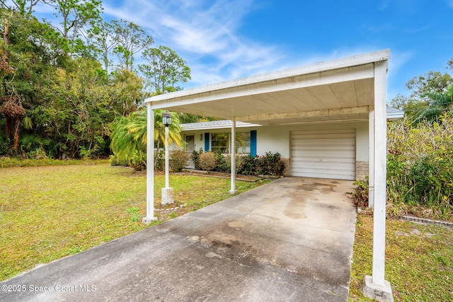 exterior space featuring a garage and a front lawn