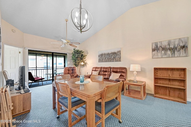 dining area featuring ceiling fan with notable chandelier, carpet floors, and lofted ceiling