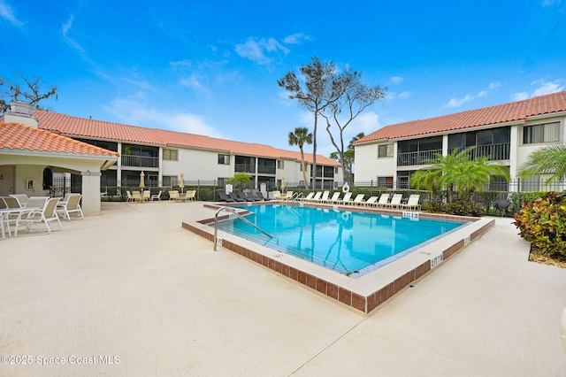 view of pool featuring a patio area