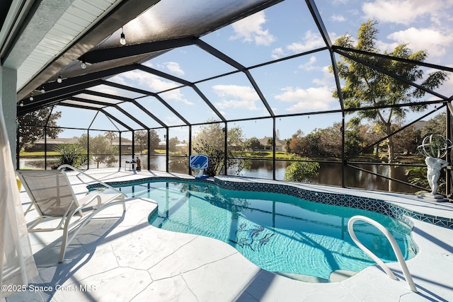 view of swimming pool featuring a patio, a water view, and glass enclosure