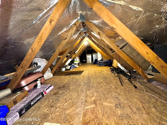 view of unfinished attic